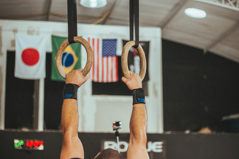 Gymnist on gymnastics rings